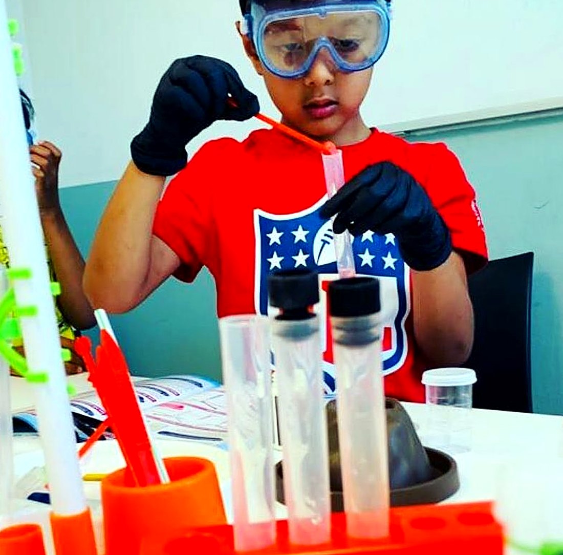 Test tubes and safety goggles